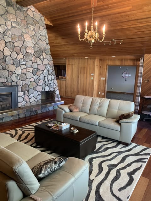 outstanding woodwork and vaulted ceilings with overlook of the sunset