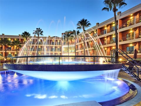 Indoor pool, outdoor pool, pool umbrellas, sun loungers