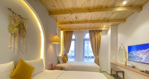 Standard Triple Room, Multiple Beds, Ground Floor | Pillowtop beds, individually decorated, desk, blackout drapes