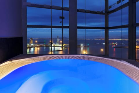 Indoor pool, outdoor pool, open 6:00 AM to 10:00 PM, pool umbrellas