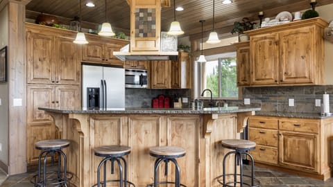 Full kitchen; Island sits 4 located on main floor
