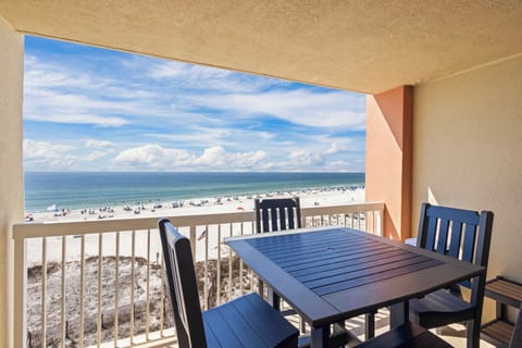 Step onto your private balcony and take in panoramic views of sugar-white sand and turquoise waters. This is the perfect place to enjoy morning coffee or sunset dinners while soaking in the sights and sounds of the beach—just steps from your door.