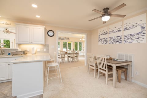 Another table with 2 chairs and bench.  Seating for 4.