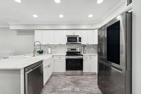 Fully Equipped Kitchen with Stainless Steel Appliances