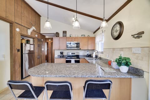 Fully equipped kitchen. Eat in counter space. Lots of room to cook! 
