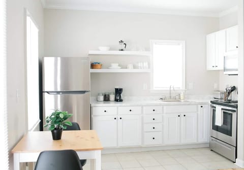 Cook up a storm in our stunning stainless kitchen.