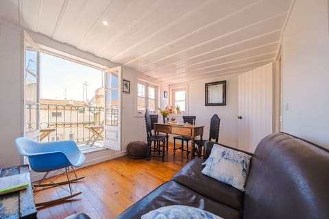 Comfortable and inviting living room with a small terrace.