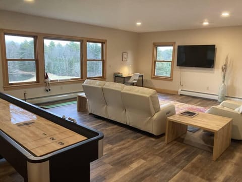 Large living room overlooking the pond