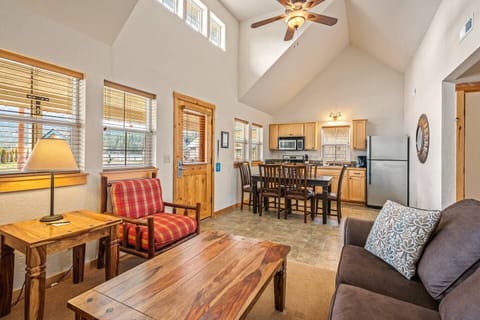 Living Area, dining area and kitchen feature high celings.