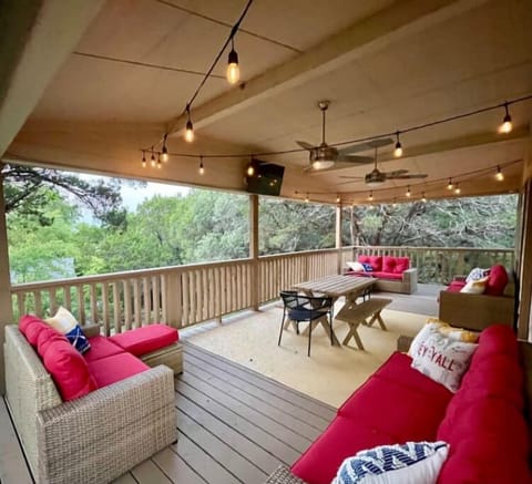 Massive covered deck is perfect for chillin' and grillin'.