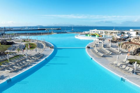 2 outdoor pools, pool umbrellas, sun loungers