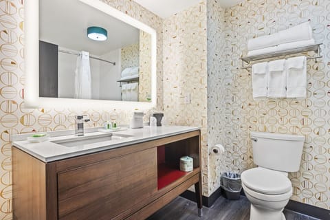 Designer toiletries, hair dryer, towels, soap