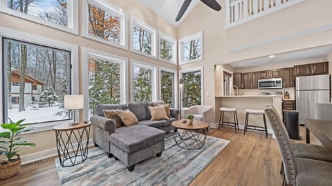【Living + Dining Area】Large two story stacked windows light up the space for all your family