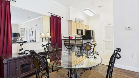 Dining table in main living area that seats 4