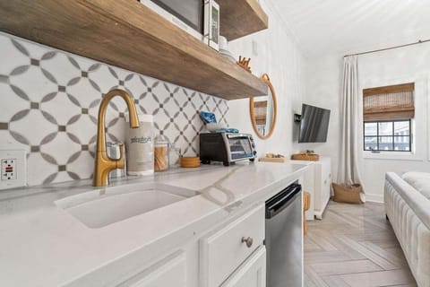 Kitchenette with microwave and under counter refrigerator