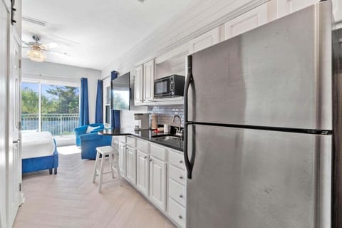 Kitchenette with microwave and full size refrigerator