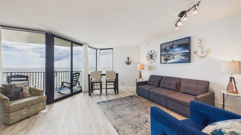 Open concept living area with comfy furnishings and sleeper sofa (sleeps 2)