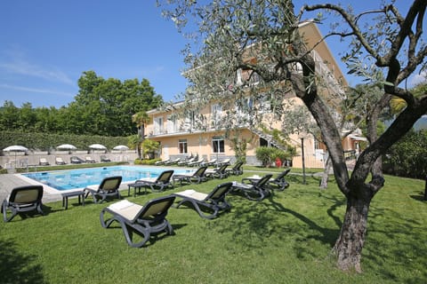 Seasonal outdoor pool, pool umbrellas, sun loungers
