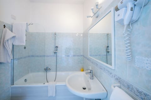 Quadruple Room, Sea View | Bathroom | Free toiletries, hair dryer, towels