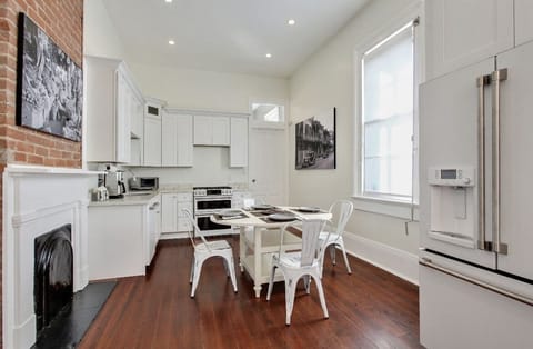 Spacious kitchen with stainless steel appliances. For cooking and entertainment.