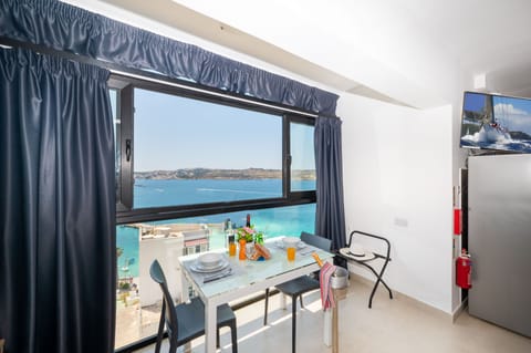 Standard Studio | Living area | 43-inch LCD TV with satellite channels, TV
