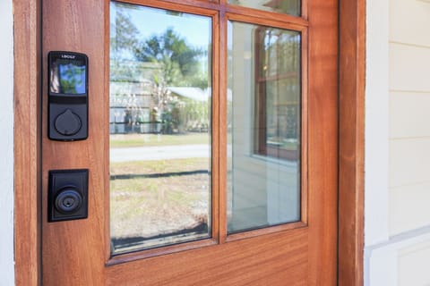 Secure front door with modern lock, peace of mind for your relaxing stay.