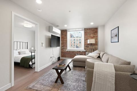 Relax in style—cozy seating with curated art and design accents.