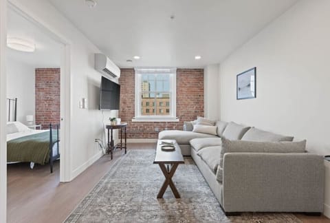 Relax in style—cozy seating with curated art and design accents.