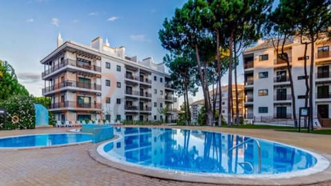 A shared outdoor swimming pool, in a spacious area, perfect for a good time around family or friends #pool #algarve #sun #airbnb