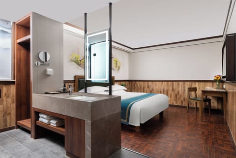 Basic Double Room | Living area | 42-inch LCD TV with cable channels, printers