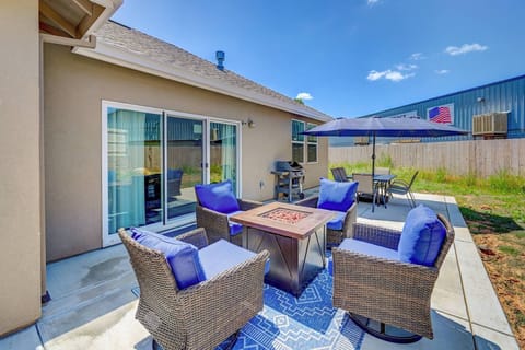 Back patio with dining area, propane bbq and gas firepit.  The landscaping is now done!