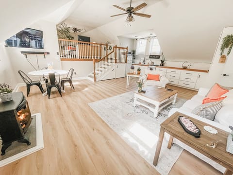 Open concept living room/kitchen/dining room space