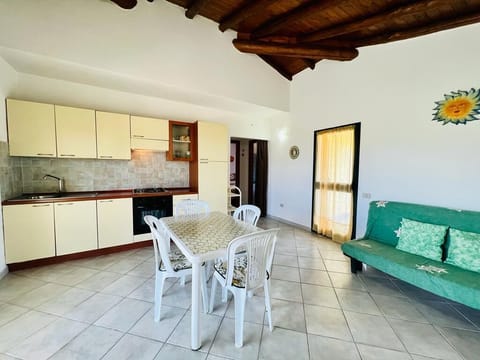 Apartment | Living area | 22-inch flat-screen TV with cable channels