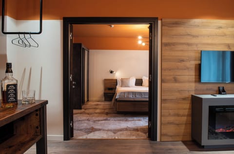 Premium Room | Living area | 110-cm Smart TV with cable channels, TV