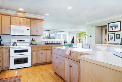 Large thoughtfully stocked kitchen