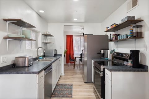 Galley kitchen with coffee and espresso machines