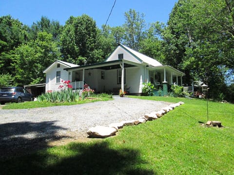Farmstead house with pull in parking spots. Side porch entry, keypad door