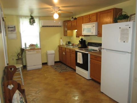 View from dining room area looking into kitchen area