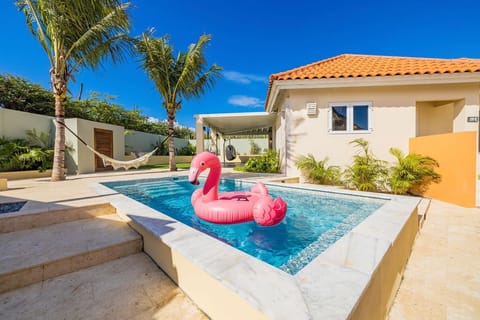 Swim with your family and friends and take in the scenery. This private pool with a hammock by the pool is a dreamy setting for everyone to enjoy.