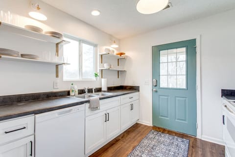 Kitchen with door to the backyard.