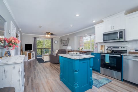 Feel right at home in your warm and welcoming kitchen, complete with all the amenities you need to cook and enjoy delicious meals during your stay.