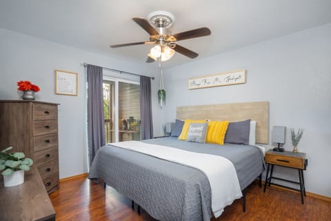 Spacious master bedroom featuring a king-size bed and ensuite bathroom.