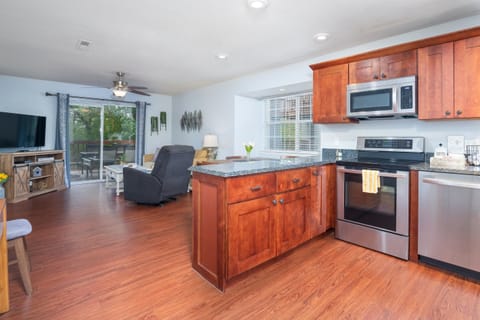 Spacious kitchen island for meal prep and casual seating.