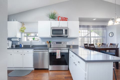 Get inspired to cook and entertain in the stylish and fully equipped kitchen, complete with all the modern amenities you need to whip up a delicious meal.