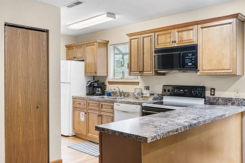 Get inspired to cook and entertain in the stylish and fully equipped kitchen, complete with all the modern amenities you need to whip up a delicious meal