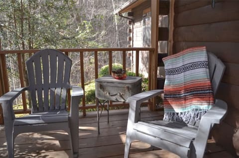 Screened-in porch at entrance.