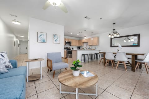 Large size common area features sleeper sofa, dining table for 6 and fully equipped kitchen