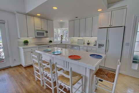 The Large Island is in the kitchen to enjoy and have a meal.