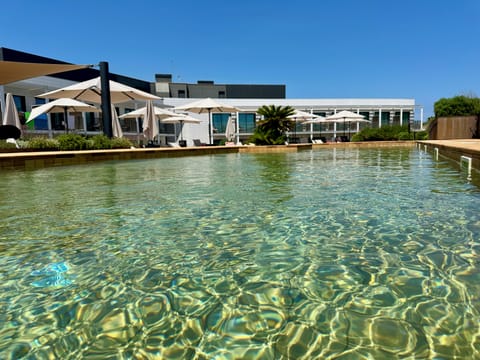 Seasonal outdoor pool, pool umbrellas, sun loungers
