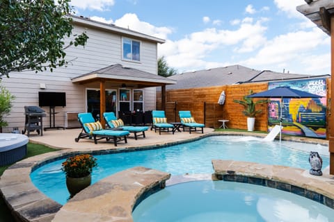 Dive into the lap of luxury with a 30ft pool, spa, and sun-soaked loungers.